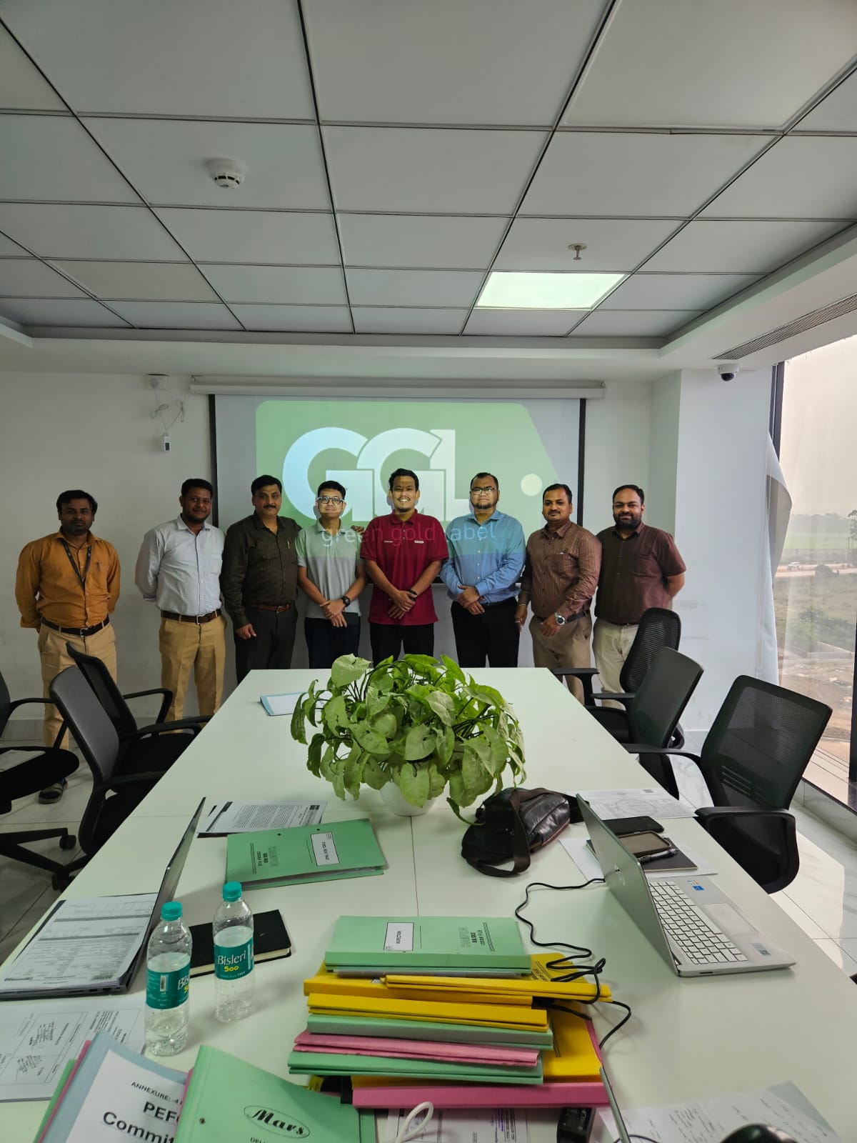 Team photographed after a Green Gold Label certification meeting